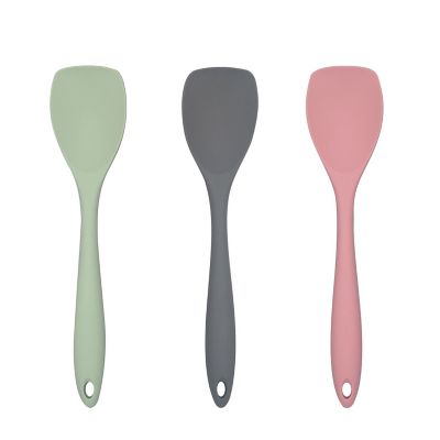 The Dream Form Mini Spoon Silicon Teaspoon scrapes jar clean and sits up  -Orange